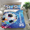 Blue geometric soccer bedding set displayed in a bright bedroom with matching pillowcases