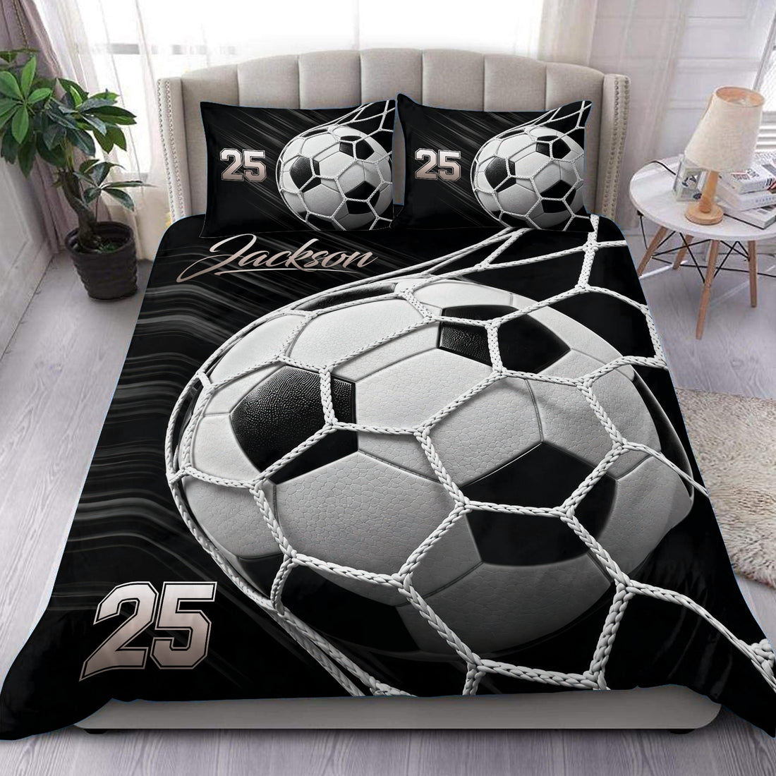 Black and white soccer duvet cover set displayed on a modern bedroom bed with matching ball artwork