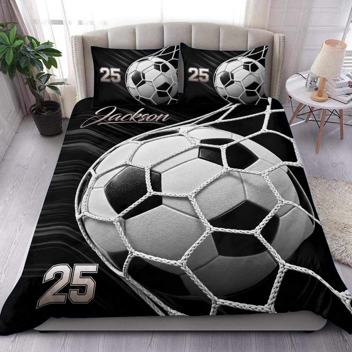 Black and white soccer duvet cover set displayed on a modern bedroom bed with matching ball artwork