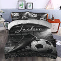 Soccer duvet cover styled in a bedroom with stadium, cleat, soccer ball, and field design