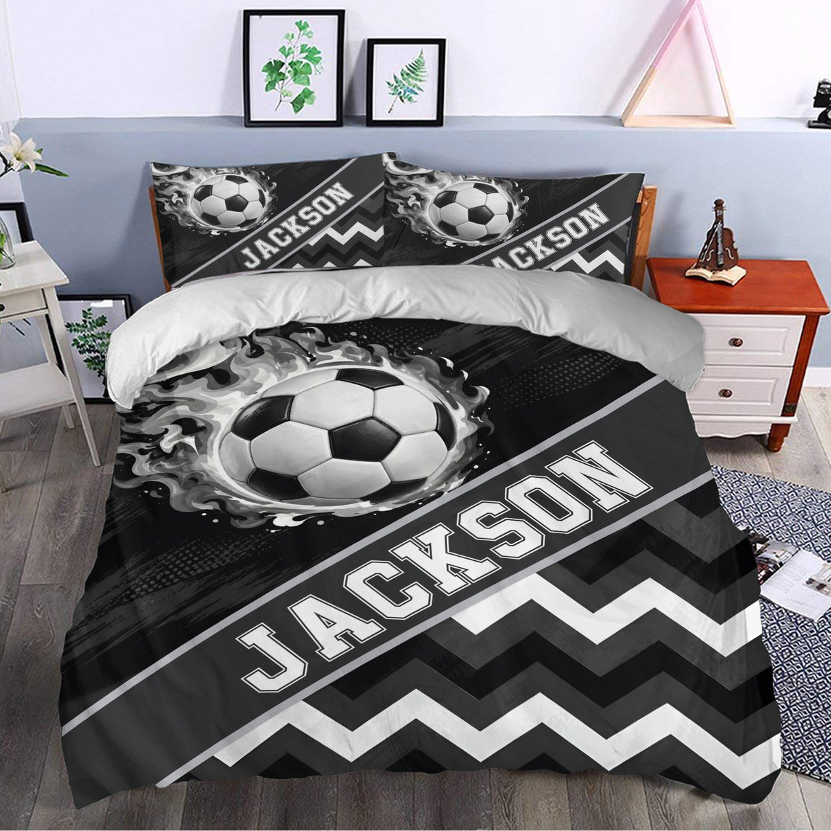 Soccer duvet cover bedding set styled in a bedroom with dramatic black, white, and gray artwork