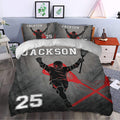 Lacrosse duvet cover bedding set styled in a bedroom with dramatic black, gray, and red artwork