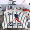 Baseball duvet cover in a styled bedroom, featuring a star-patterned batter, bat, ball, and classic pinstripes