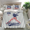 Baseball bedding displayed in a bright bedroom with navy pinstripes, red accents, batter artwork, and matching pillows