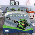 Lacrosse duvet cover bedding set styled in a bedroom with green helmet artwork, navy borders, and geometric accents