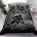 Black and gray hockey duvet cover set displayed on a bedroom with skater artwork and matching pillowcases