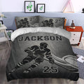 Hockey duvet cover set styled in a bedroom with bold black and gray skater artwork and sports decor