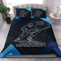Custom hockey duvet cover set in navy and blue with an ice hockey player design and matching pillowcases