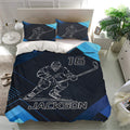 Navy hockey duvet cover bedding set shown in a bright bedroom with matching pillowcases and bold player artwork