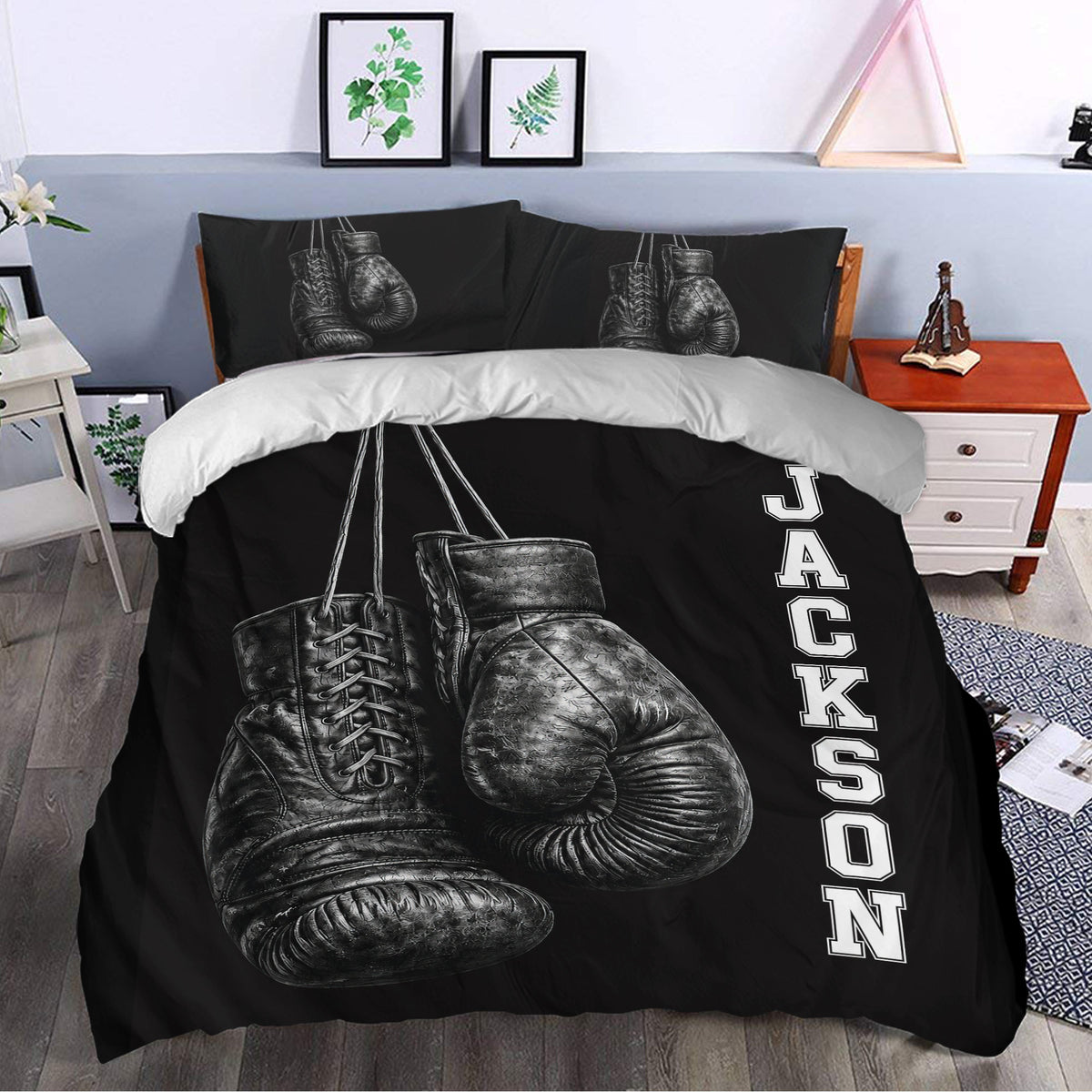 Black boxing duvet cover bedding set styled in a modern bedroom with glove and boot artwork