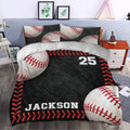 Baseball bedding set styled in a bedroom with large baseball graphics, red accents, and a bold black background