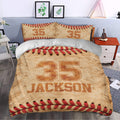 Baseball bedding displayed in a modern bedroom with red stitching, tan texture, and bold sports-inspired artwork