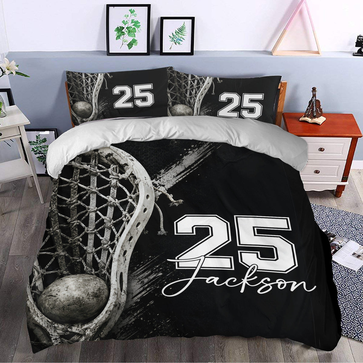 Black lacrosse bedding set styled in a bedroom with bold field-inspired artwork and matching pillowcases