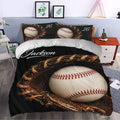 Baseball bedding displayed in a bedroom with a dramatic baseball and glove pattern