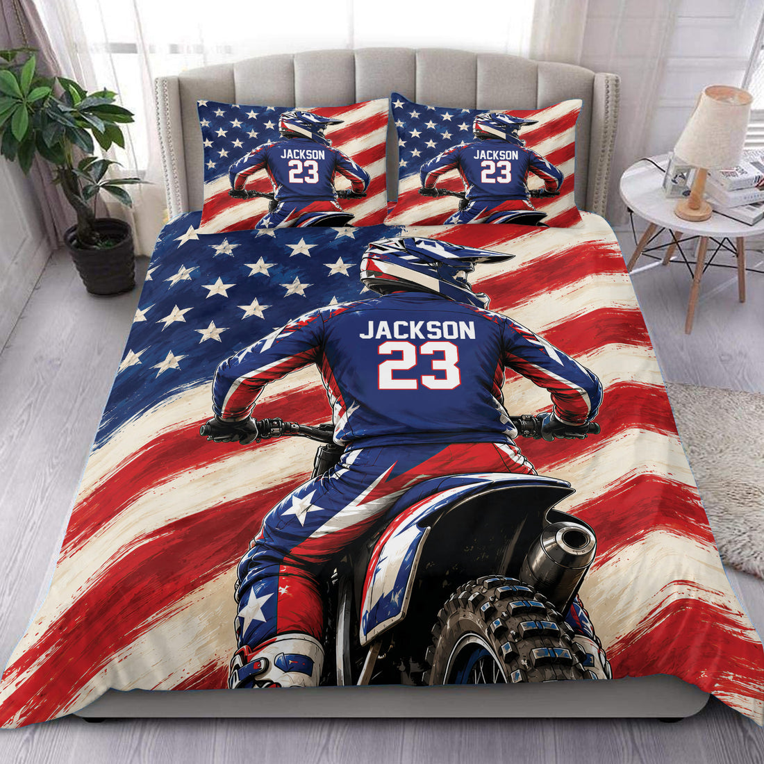 Motocross duvet cover set displayed on a bed with dirt bike rider artwork and red, white, and blue stars