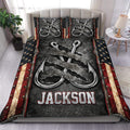 Fishing duvet cover set displayed on a bed with oversized metal hooks, rugged textures, stars and red accents