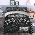 Black racing duvet cover styled in a bedroom with checkered flags, crossed rods, and custom racing artwork