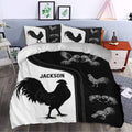 Black and white chicken bedding set styled in a contemporary bedroom with rooster illustrations