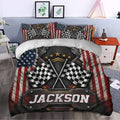 Racing duvet cover styled in a bedroom with crossed checkered flags and dramatic black, red, white, and blue decor