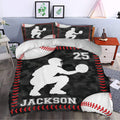 Baseball bedding in a styled bedroom with bold red stitching, black camouflage, and a baseball player design