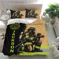 Firefighter bedroom decor with dramatic firefighter artwork, department emblem, and matching pillowcases