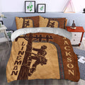 Rustic lineman duvet cover bedding set styled in a bedroom with brown and tan artwork