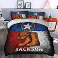 Cowboy duvet cover styled in a bedroom with western hat, boots, star, chain, and rustic flag-inspired artwork