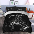 Black wrestling duvet cover set styled in a modern bedroom with dramatic grappling artwork