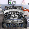 Racing duvet cover set styled in a bedroom with checkered flags, metallic panels, and blue accents