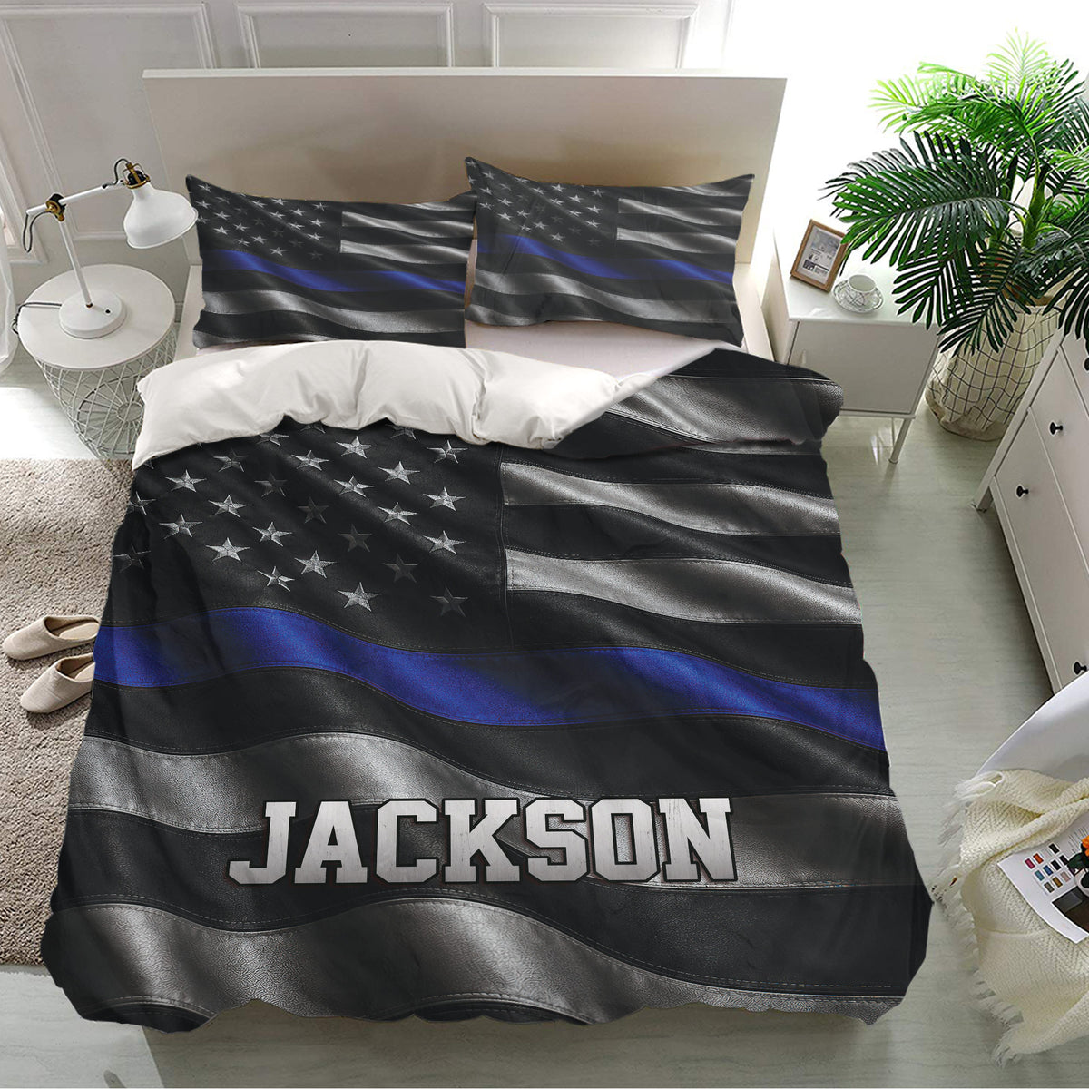 Police bedding set presented in a bright bedroom with matching pillowcases and bold thin blue line design