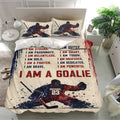 Hockey bedding set displayed in a bright bedroom with matching pillowcases and dynamic goalie artwork