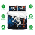 Basketball bedding set shown with matching pillowcases and bold black, blue and orange artwork