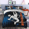 Basketball duvet cover styled in a bedroom with a bold dunking player, geometric accents and orange lettering
