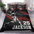 Black baseball duvet cover set with batter artwork, red stitching accents, and bold bedroom styling