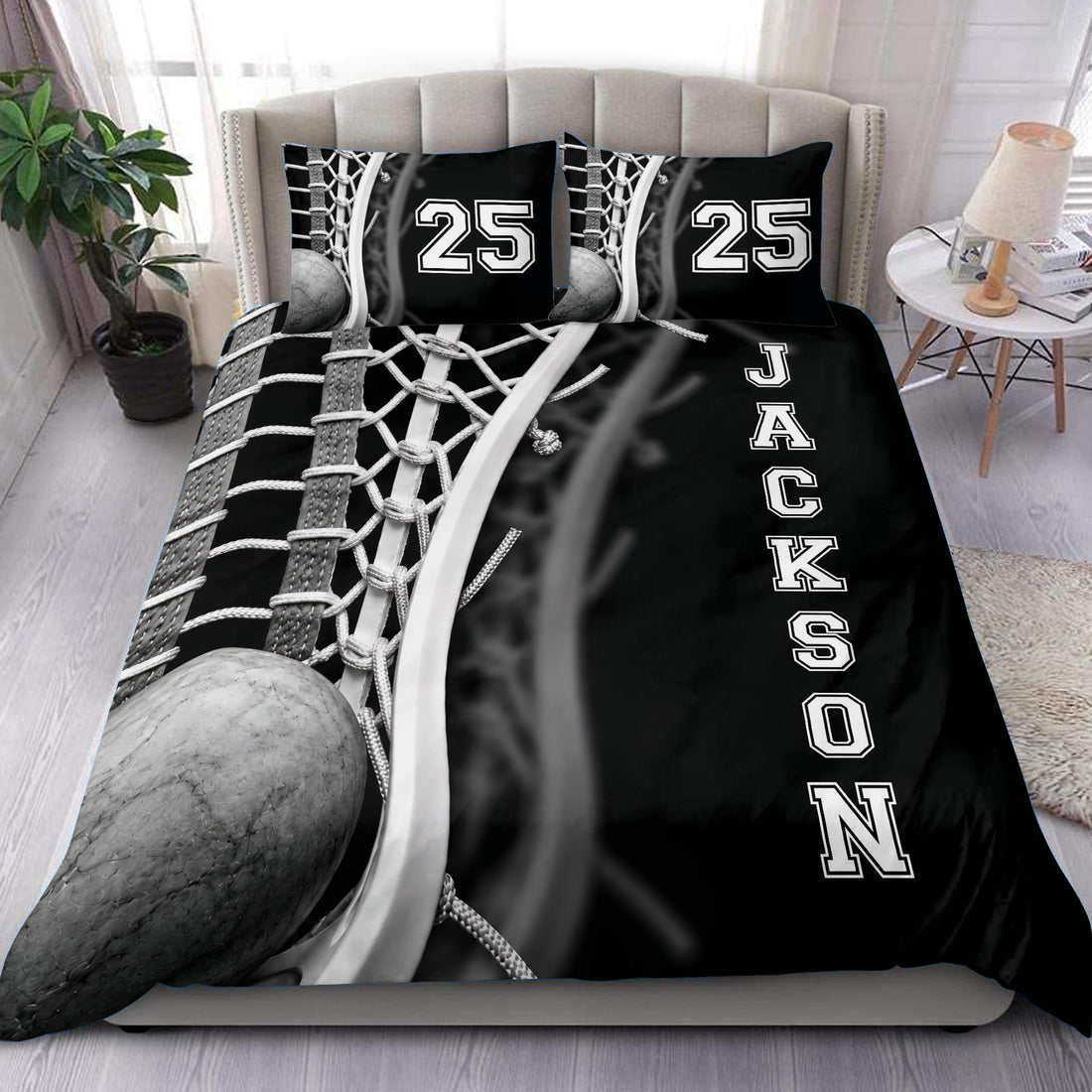 Black and white lacrosse duvet cover set styled on a modern bedroom bed with matching pillowcases