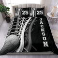 Black and white lacrosse duvet cover set styled on a modern bedroom bed with matching pillowcases