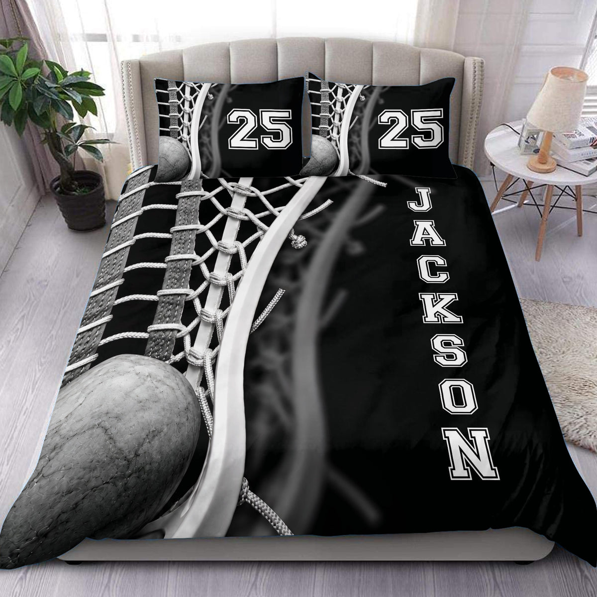 Black and white lacrosse duvet cover set styled on a modern bedroom bed with matching pillowcases