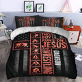 Faith-inspired wrestling duvet cover set styled in a modern bedroom with black and red athletic artwork
