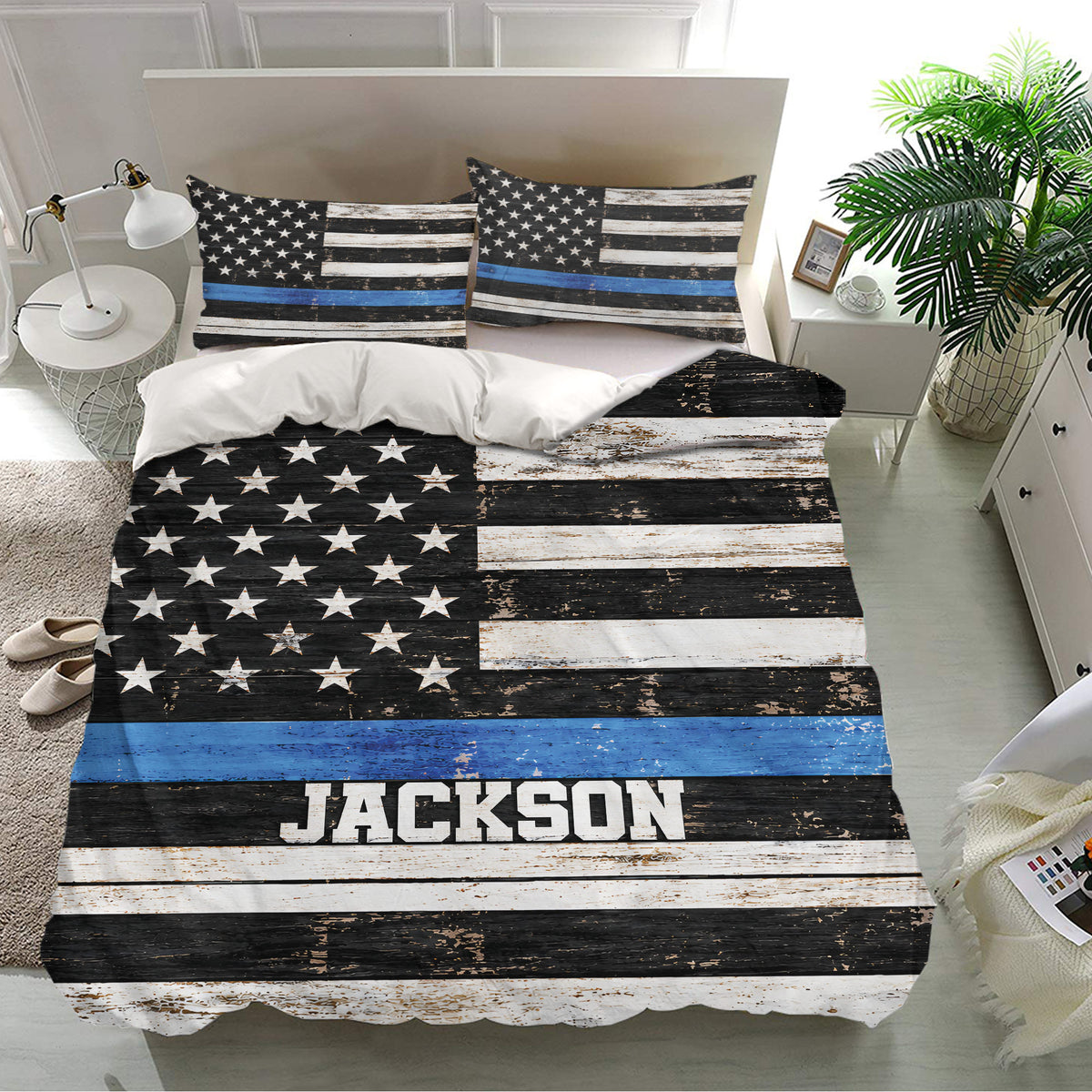 Police bedding set displayed in a bright bedroom with distressed flag stripes and blue accent