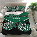 Cheerleading duvet cover bedding set in green, black, and white with matching pom-pom pillowcases