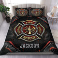 Firefighter duvet cover set displayed on a bed with black, red, and gold rescue emblem artwork