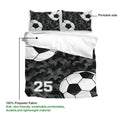 Soccer duvet cover set with black camouflage artwork, soccer balls, and soft polyester fabric details