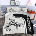 Wrestling duvet cover bedding set presented in a bedroom with bold black and white athletic artwork