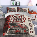 Firefighter bedroom decor with a red fire truck duvet cover, firefighting emblem, and matching pillowcases