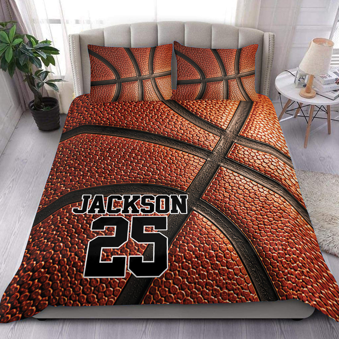 Custom basketball duvet cover set displayed on a bed with bold orange ball texture and black sports detailing