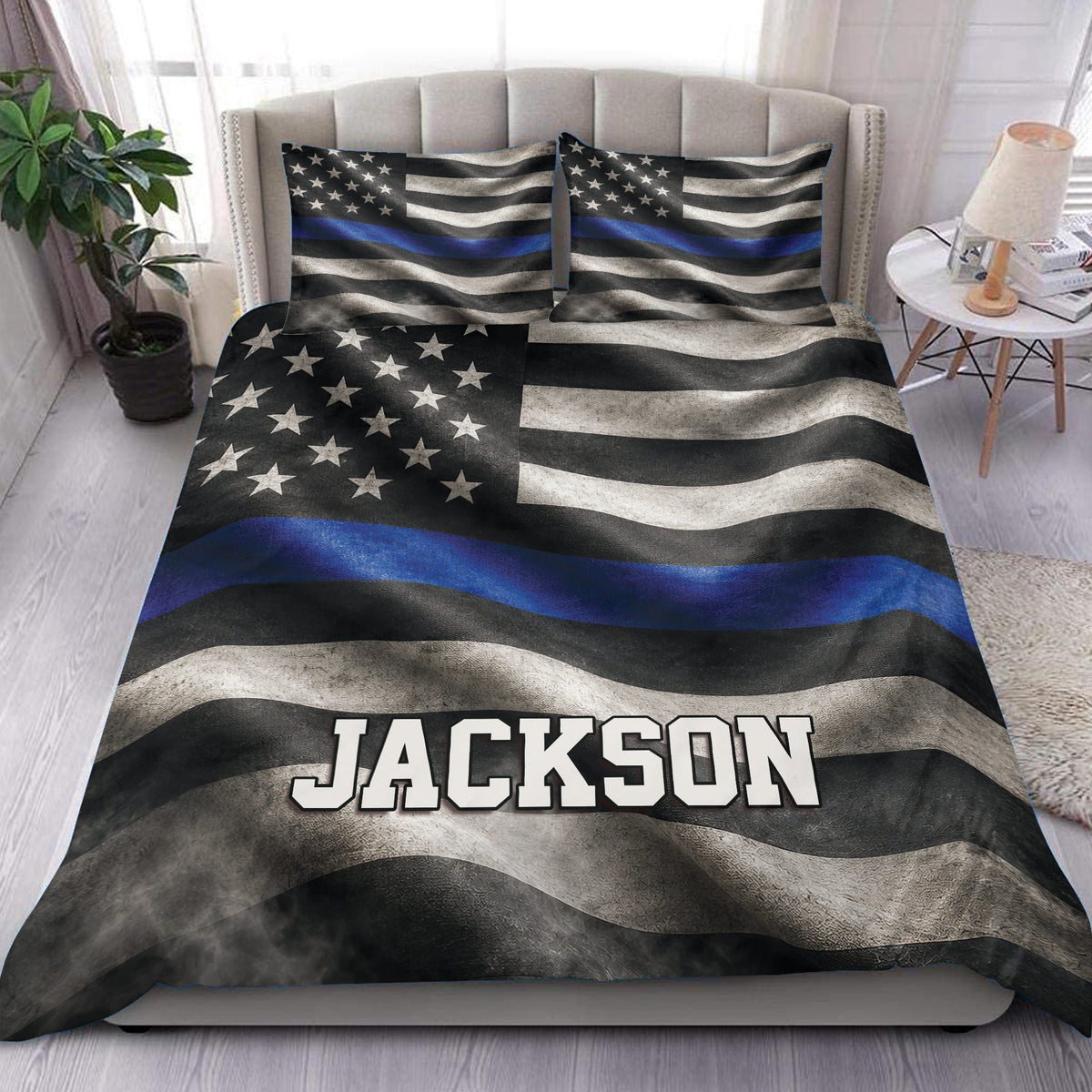Police duvet cover set displayed on a bed with a distressed blue line flag design and custom text