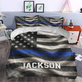 Police bedroom decor featuring a blue line flag duvet cover set styled on a modern bed