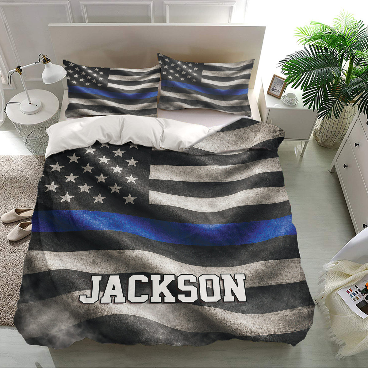 Police bedding set displayed in a bright bedroom with distressed blue line flag design and custom text