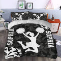Black and white cheerleading duvet cover set styled in a modern bedroom with pom-pom artwork