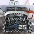 Racing duvet cover set styled in a modern bedroom with blue-black graphics and crossed flags